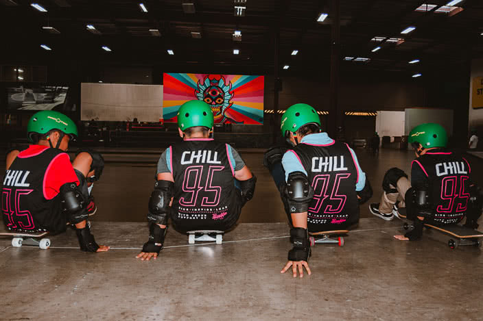 Kids Sitting on Skateboards