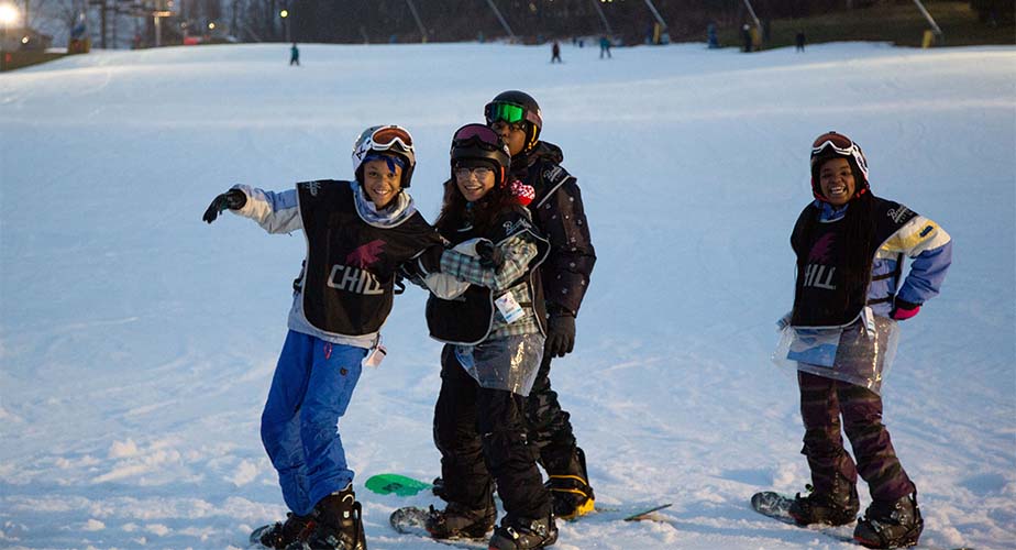 Chill youth smiling together on the slopes