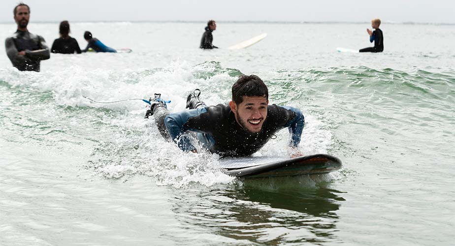 Chill Portland youth surfing a wave