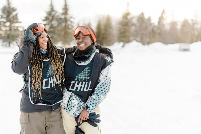 Two Friends Standing in Snow