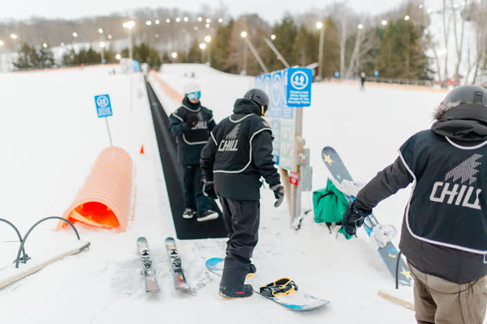 Snowboarders at Ski Lift